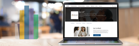 A laptop on a wooden table displays a webpage about the EQ-i 2.0. The background features the MHS logo layered on top of a blurred indoor setting with people.