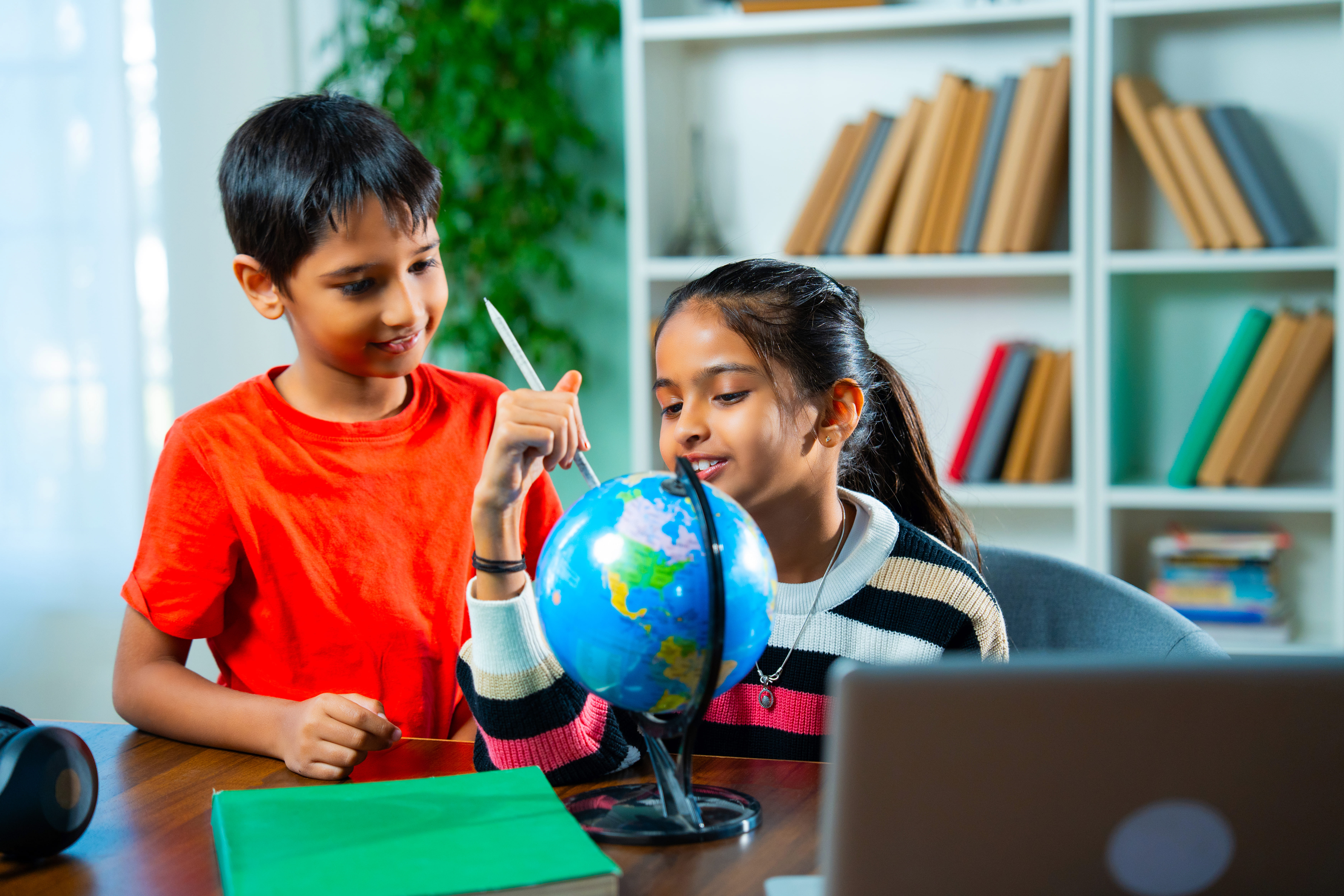 Two young people sitting together, illustrating youth mental health concerns